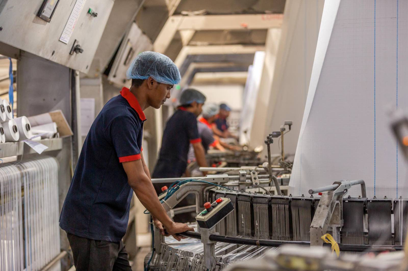 Woven conductive fabric under inspection on the Pegma production line